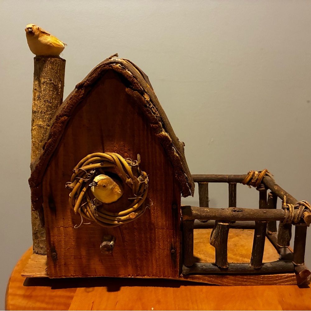 Source Unknown: Rustic Birdhouse with Brown and Cream Details